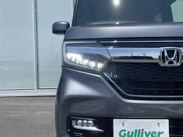 ホンダ Ｎ ＢＯＸ カスタム G L ターボ ホンダセンシング 神奈川県 2018(平30)年 6.9万km シャイニンググレーM ・純正ナビ　/・バックカメラ　/・ビルトインＥＴＣ　/・Ｂｌｕｅｔｏｏｔｈ　/・ＤＶＤ　ＣＤ　/・フルセグＴＶ　/・両側パワースライドドア　/・ＬＥＤヘッドライト　/・フォグランプ　/・ＵＳＢ給電×２　/・パドルシフト　/・ロールサンシェード/・スマートキー/・プッシュスタート/・純正アルミホイール/・純正フロアマット/・オートライト/・オートエアコン