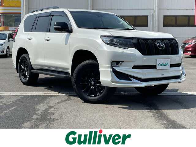 トヨタ ランドクルーザー プラド TX Lパッケージ マットブラED 群馬県 2022(令4)年 1.9万km ホワイトパールクリスタルシャイン モデリスタフルエアロ　/ムーンルーフ　/メーカーオプションナビ　/全周囲カメラ　/フルセグ・Ｂｌｕｅｔｏｏｔｈ。CD・DVD　/ベージュ革　/シートエアコン　/レーンアシスト　/衝突軽減ブレーキ　/コーナーセンサー　/ヒッチメンバー/ETC2.0/純正フロアマット