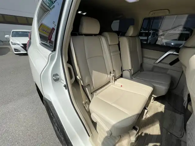 トヨタ ランドクルーザー プラド TX Lパッケージ マットブラED 群馬県 2022(令4)年 1.9万km ホワイトパールクリスタルシャイン モデリスタフルエアロ　/ムーンルーフ　/メーカーオプションナビ　/全周囲カメラ　/フルセグ・Ｂｌｕｅｔｏｏｔｈ。CD・DVD　/ベージュ革　/シートエアコン　/レーンアシスト　/衝突軽減ブレーキ　/コーナーセンサー　/ヒッチメンバー/ETC2.0/純正フロアマット