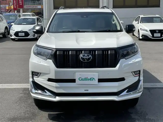 トヨタ ランドクルーザー プラド TX Lパッケージ マットブラED 群馬県 2022(令4)年 1.9万km ホワイトパールクリスタルシャイン モデリスタフルエアロ　/ムーンルーフ　/メーカーオプションナビ　/全周囲カメラ　/フルセグ・Ｂｌｕｅｔｏｏｔｈ。CD・DVD　/ベージュ革　/シートエアコン　/レーンアシスト　/衝突軽減ブレーキ　/コーナーセンサー　/ヒッチメンバー/ETC2.0/純正フロアマット