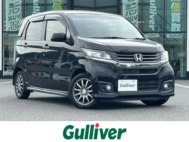 ホンダ Ｎ ＷＧＮ カスタム G ターボパッケージ 岡山県 2015(平27)年 6万km スマートブラック 登録時走行距離60052km/ワンオーナー/社外ナビ/地デジTV(AM.FM.CD.DVD.TV.BT)/ETC/あんしんパッケージ/衝突軽減ブレーキ/クルーズコントロール/オートライト/アイドリングストップ/横滑り防止装置/14インチ純正AW/純正フロアマット/プッシュスタート/スマートキー/パドルシフト