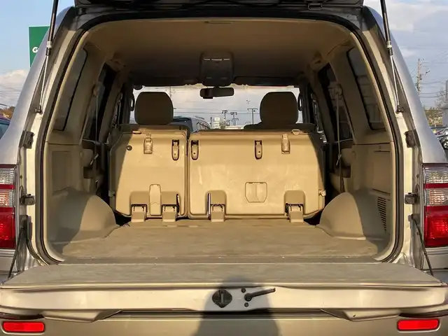 トヨタ ランドクルーザー VX－LTD 道央・札幌 2002(平14)年 12.9万km ウォームシルバーM ４WD/寒冷地仕様/純正メーカーナビ/AM/FM/CD/MD/クルーズコントロール/バックカメラ/ETC/ドライブレコーダー/センターデフロック/クールボックス/PWRMODE/2ndstart/トランスファレバー/Fシートヒーター/革巻きウッドコンビステアリング/ステアリングリモコン/リモコンキー/ハロゲンヘッドライト/オートライト/フォグランプ/ヘッドライトウォッシャー/電動格納ミラー/ヒーテッドドアミラー/純正フロアマット/ドアバイザー/リアフォグランプ/スペアキー/社外エンジンスターター/社外AW付冬タイヤ積込/275/65/R17/2020年/山8mm