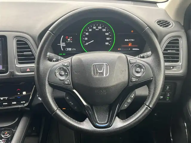 ホンダ ヴェゼル ハイブリッド 秋田県 2017(平29)年 8.1万km ホワイトオーキッドパール 社外ナビ/衝突軽減システム/LEDヘッドライト/４WD/純正アルミ/フルセグ/バックカメラ/スマートキー/アイドリングストップ/プッシュスタート/レーンキープアシスト/コーナーセンサー/クルーズコントロール/パドルシフト/パーキングアシスト/前席シートヒーター/純正フロアマット/純正ドアバイザー/ETC/オートライト/オートエアコン/パワーステアリング/パワーウィンドウ/横滑り防止/電動格納ウィンカーミラー
