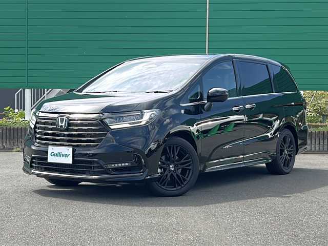 ホンダ オデッセイ ハイブリッド e:HEVアブソルート EXブラックED 茨城県 2024(令6)年 0.9万km 黒 Honda SENSING/純正9インチHonda CONNECTナビ/-フルセグTV　Bluetooth /全周囲 バック フロント サイドカメラ/両側パワースライドドア/路外逸脱抑制機能/渋滞追従機能付アダプティブクルーズコントロール/車線維持支援システム/オートハイビーム/ブラインドスポットインフォメーション/LEDシーケンシャルターンシグナルランプ/LEDオートヘッドライト LEDフォグライト/本革シート/前席後席シートヒーター/純正18インチアルミホイール/本革巻ステアリングホイール/ステアリングスイッチ/ワイヤレス充電/スマートキー/ビルトインETC2.0
