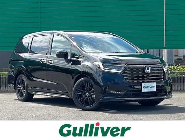 ホンダ オデッセイ ハイブリッド e:HEVアブソルート EXブラックED 茨城県 2024(令6)年 0.9万km 黒 Honda SENSING/純正9インチHonda CONNECTナビ/-フルセグTV　Bluetooth /全周囲 バック フロント サイドカメラ/両側パワースライドドア/路外逸脱抑制機能/渋滞追従機能付アダプティブクルーズコントロール/車線維持支援システム/オートハイビーム/ブラインドスポットインフォメーション/LEDシーケンシャルターンシグナルランプ/LEDオートヘッドライト LEDフォグライト/本革シート/前席後席シートヒーター/純正18インチアルミホイール/本革巻ステアリングホイール/ステアリングスイッチ/ワイヤレス充電/スマートキー/ビルトインETC2.0