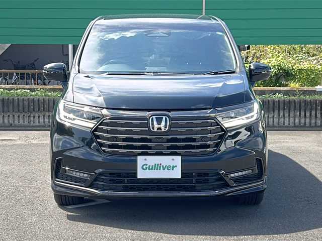 ホンダ オデッセイ ハイブリッド e:HEVアブソルート EXブラックED 茨城県 2024(令6)年 0.9万km 黒 Honda SENSING/純正9インチHonda CONNECTナビ/-フルセグTV　Bluetooth /全周囲 バック フロント サイドカメラ/両側パワースライドドア/路外逸脱抑制機能/渋滞追従機能付アダプティブクルーズコントロール/車線維持支援システム/オートハイビーム/ブラインドスポットインフォメーション/LEDシーケンシャルターンシグナルランプ/LEDオートヘッドライト LEDフォグライト/本革シート/前席後席シートヒーター/純正18インチアルミホイール/本革巻ステアリングホイール/ステアリングスイッチ/ワイヤレス充電/スマートキー/ビルトインETC2.0