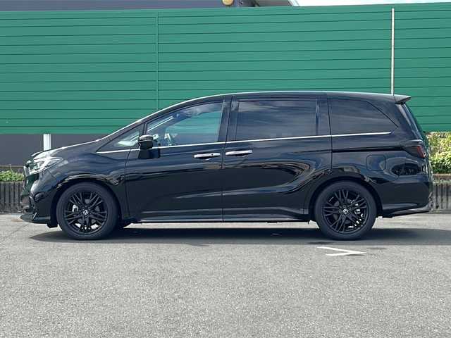 ホンダ オデッセイ ハイブリッド e:HEVアブソルート EXブラックED 茨城県 2024(令6)年 0.9万km 黒 Honda SENSING/純正9インチHonda CONNECTナビ/-フルセグTV　Bluetooth /全周囲 バック フロント サイドカメラ/両側パワースライドドア/路外逸脱抑制機能/渋滞追従機能付アダプティブクルーズコントロール/車線維持支援システム/オートハイビーム/ブラインドスポットインフォメーション/LEDシーケンシャルターンシグナルランプ/LEDオートヘッドライト LEDフォグライト/本革シート/前席後席シートヒーター/純正18インチアルミホイール/本革巻ステアリングホイール/ステアリングスイッチ/ワイヤレス充電/スマートキー/ビルトインETC2.0