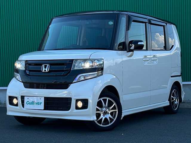 ホンダ Ｎ ＢＯＸ カスタム G Lパッケージ 宮城県 2015(平27)年 7.2万km プレミアムホワイトパールⅡ 2トーンカラースタイル/シルバー塗装メータリング/リアシートスライド＋シートバックテーブル/＝＝＝/純正11インチフリップダウンモニター（VM-155EN）/純正ナビ（VXM-152VFi）/・CD/DVD/・Bluetooth/・フルセグTV/ETC/ドライブレコーダー/左側パワースライドドア/革巻きステアリング/ステアリングスイッチ/HIDヘッドランプ/フォグランプ/オートライト/スマートキー＆プッシュスタート/電動格納ミラー/リア席サンシェード/社外14インチAW/ドアバイザー/フロアマット/Wエアバッグ