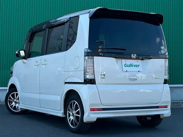 ホンダ Ｎ ＢＯＸ カスタム G Lパッケージ 宮城県 2015(平27)年 7.2万km プレミアムホワイトパールⅡ 2トーンカラースタイル/シルバー塗装メータリング/リアシートスライド＋シートバックテーブル/＝＝＝/純正11インチフリップダウンモニター（VM-155EN）/純正ナビ（VXM-152VFi）/・CD/DVD/・Bluetooth/・フルセグTV/ETC/ドライブレコーダー/左側パワースライドドア/革巻きステアリング/ステアリングスイッチ/HIDヘッドランプ/フォグランプ/オートライト/スマートキー＆プッシュスタート/電動格納ミラー/リア席サンシェード/社外14インチAW/ドアバイザー/フロアマット/Wエアバッグ