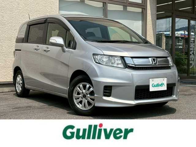 ホンダ フリード スパイク G プレミアムエディション 大阪府 2015(平27)年 3.3万km アラバスターシルバーメタリック 社外SDナビ/（BT・CD・DVD）/バックカメラ/クルーズコントロール/横滑り防止システム/両側パワースライドドア/ハーフレザーシート/純正１４インチアルミキャップ/ETC/ドライブレコーダー/保証書/取扱説明書/スペアキー有