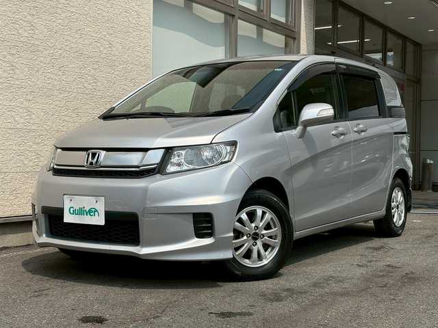 ホンダ フリード スパイク G プレミアムエディション 大阪府 2015(平27)年 3.3万km アラバスターシルバーメタリック 社外SDナビ/（BT・CD・DVD）/バックカメラ/クルーズコントロール/横滑り防止システム/両側パワースライドドア/ハーフレザーシート/純正１４インチアルミキャップ/ETC/ドライブレコーダー/保証書/取扱説明書/スペアキー有