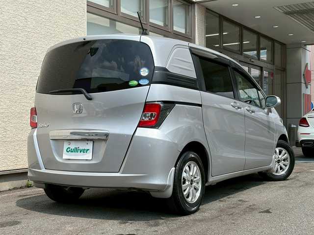ホンダ フリード スパイク G プレミアムエディション 大阪府 2015(平27)年 3.3万km アラバスターシルバーメタリック 社外SDナビ/（BT・CD・DVD）/バックカメラ/クルーズコントロール/横滑り防止システム/両側パワースライドドア/ハーフレザーシート/純正１４インチアルミキャップ/ETC/ドライブレコーダー/保証書/取扱説明書/スペアキー有