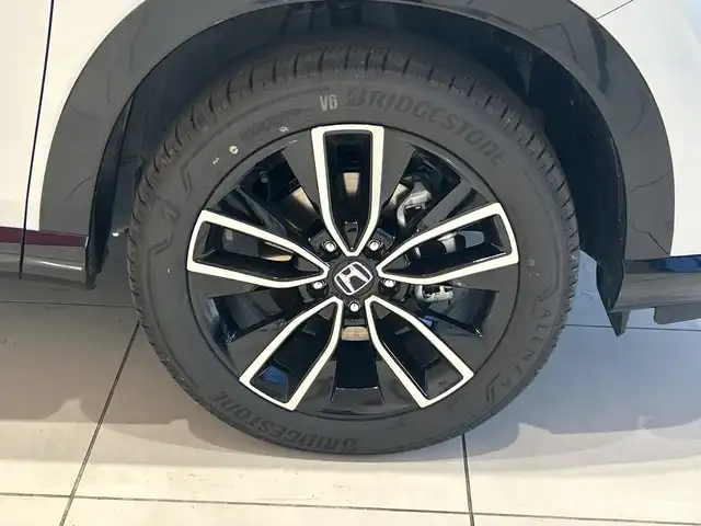 ホンダ ヴェゼル ハイブリッド e:HEV Z PLaYパッケージ 埼玉県 2025(令7)年 0.1万km プレミアムサンライトホワイトパール ホンダセンシング/純正9インチナビ/ BT/フルセグ/カープレイ/バックカメラ/パワーバックドア/レーダークルーズコントロール/レーンキープアシスト/LEDヘッドライト/ハーフレザーシート/シートヒーター/純正18インチアルミホイール/ステアリングヒーター/ワイヤレス充電/パドルシフト/ETC2.0/スマートキー×2/禁煙車