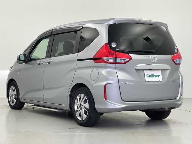 ホンダ フリード ハイブリット G ホンダセンシング 愛知県 2018(平30)年 3.2万km ルナシルバーM ６人乗り/純正SDナビ/バックカメラ/ビルトインETC/オートサイドステップ/両側パワースライドドア/ホンダセンシング/・衝突軽減ブレーキ（CMBS)/・車線維持支援システム（LKAS)/・アダプティブクルーズコントロール/・先行車発信お知らせ機能/・標識認識機能/・誤発進抑制/・路外逸脱抑制機能/・歩行者事故低減システム/横滑り防止/ワイパーデアイサ/LEDヘッドライト　アクティブコーナリングライト/電動格納ウィンカーミラー/スペアキー