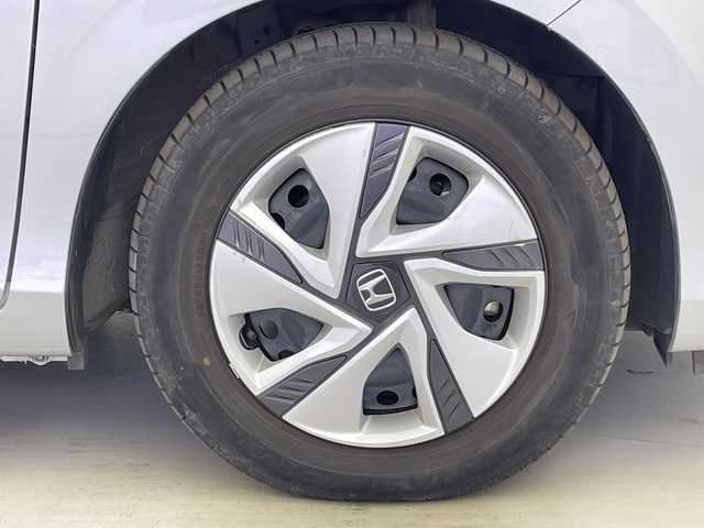 ホンダ フリード ハイブリット G ホンダセンシング 愛知県 2018(平30)年 3.2万km ルナシルバーM ６人乗り/純正SDナビ/バックカメラ/ビルトインETC/オートサイドステップ/両側パワースライドドア/ホンダセンシング/・衝突軽減ブレーキ（CMBS)/・車線維持支援システム（LKAS)/・アダプティブクルーズコントロール/・先行車発信お知らせ機能/・標識認識機能/・誤発進抑制/・路外逸脱抑制機能/・歩行者事故低減システム/横滑り防止/ワイパーデアイサ/LEDヘッドライト　アクティブコーナリングライト/電動格納ウィンカーミラー/スペアキー