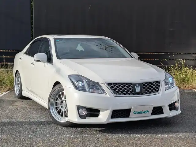 トヨタ クラウン アスリート +M Sチャージ 埼玉県 2011(平23)年 7.2万km ホワイトパールクリスタルシャイン モデリスタ架装「+Mスーパーチャージャー」/純正HDDナビ/ワンセグテレビ/Bluetoothオーディオ/バックカメラ/TEIN車高調/WORK 18インチアルミ/クルーズコントロール/サンルーフ/黒 本革シート(シートヒーター、ベンチレーション(運転席助手席))/ドアバイザー/プッシュスタート/ETC/HIDヘッドライト/スマートキー×2