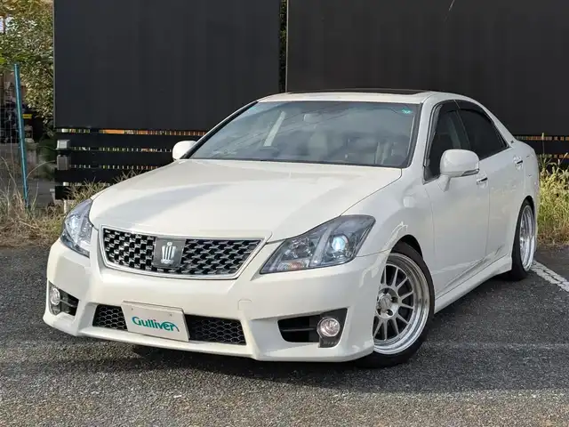 トヨタ クラウン アスリート +M Sチャージ 埼玉県 2011(平23)年 7.2万km ホワイトパールクリスタルシャイン モデリスタ架装「+Mスーパーチャージャー」/純正HDDナビ/ワンセグテレビ/Bluetoothオーディオ/バックカメラ/TEIN車高調/WORK 18インチアルミ/クルーズコントロール/サンルーフ/黒 本革シート(シートヒーター、ベンチレーション(運転席助手席))/ドアバイザー/プッシュスタート/ETC/HIDヘッドライト/スマートキー×2