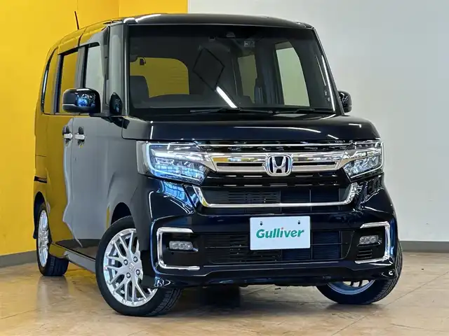 ホンダ Ｎ ＢＯＸ カスタム L ターボ 群馬県 2022(令4)年 2.7万km ミッドナイトブルービームM ホンダセンシング/・衝突軽減ブレーキ/・レーンキープアシスト/・アダプティブクルーズコントロール/・誤発進抑制機能/・パーキングソナー/・オートマチックハイビーム/両側パワースライドドア/純正8インチナビ/　　フルセグTV/    BT/AM/FM/CD/DVD/USB/SD/MSV/バックカメラ/LEDオートライト/シーケンシャルウィンカー/ハーフレザーシート/シートヒーター/純正15インチAW/パドルシフト/ステアリングスイッチ/電動パーキングブレーキ/オートホールド/フォグランプ/ドライブレコーダー/ETC/スマートキー
