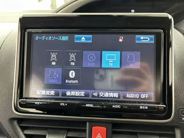 トヨタ ヴォクシー ハイブリッド ZS 煌Ⅱ 三重県 2016(平28)年 2.7万km ブラック /純正9型ナビ（フルセグ/CD/DVD/BT/AM/FM/SD)// バックカメラ //12.8型フリップダウンモニター //両側パワスラ //LEDヘッドライト //前後コーナーセンサー //オートマチックハイビーム //トヨタセーフティーセンス//レーンキープアシスト//TVキャンセラー//スマートキー