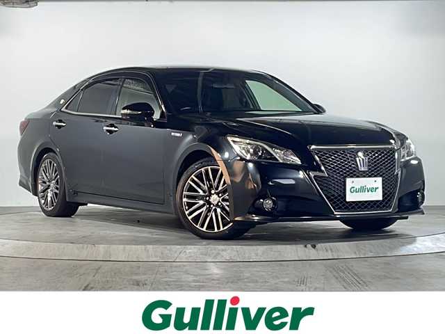 トヨタ クラウン ハイブリッド アスリートS 広島県 2014(平26)年 8万km プレシャスブラックパール 禁煙車/OP18インチアルミホイール/クルーズコントロール/純正ナビ/・フルセグ/CD/DVD/Bluetooth/USB/バックカメラ/革巻きステアリング/ステアリングヒーター/オートライト/HIDヘッドライト/フォグランプ/パワーシート/レザーシートパッケージ/・本革シート/・前席シートヒーター/ベンチレーション/ETC/ドアバイザー/W+サイド+カーテンエアバック