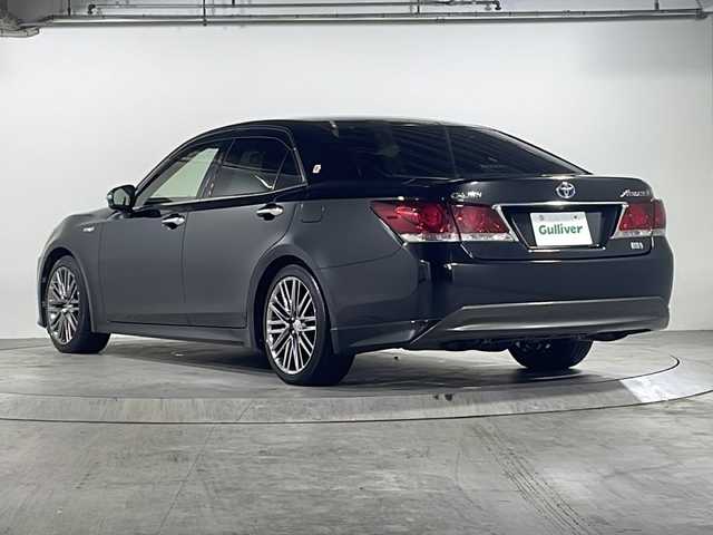 トヨタ クラウン ハイブリッド アスリートS 広島県 2014(平26)年 8万km プレシャスブラックパール 禁煙車/OP18インチアルミホイール/クルーズコントロール/純正ナビ/・フルセグ/CD/DVD/Bluetooth/USB/バックカメラ/革巻きステアリング/ステアリングヒーター/オートライト/HIDヘッドライト/フォグランプ/パワーシート/レザーシートパッケージ/・本革シート/・前席シートヒーター/ベンチレーション/ETC/ドアバイザー/W+サイド+カーテンエアバック