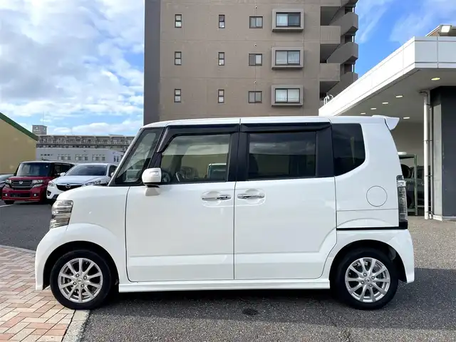 ホンダ Ｎ ＢＯＸ カスタム SSパッケージ 新潟県 2016(平28)年 7.7万km プレミアムホワイトパールⅡ (株)IDOMが運営する【じしゃロン新潟店】の自社ローン専用車両になります。/こちらは現金またはオートローンご利用時の価格です。自社ローンご希望の方は別途その旨お申付け下さい/純正ナビ/Bluetooth接続可能/CD/DVD視聴可能/フルセグTV視聴可能/バックカメラ/ビルトインETC/両側パワースライドドア/シートヒーター（D+N席）/プッシュスタート/ウィンカーミラー/ドアバイザー/スマートキー/横滑り防止装置/フォグランプ/純正フロアマット