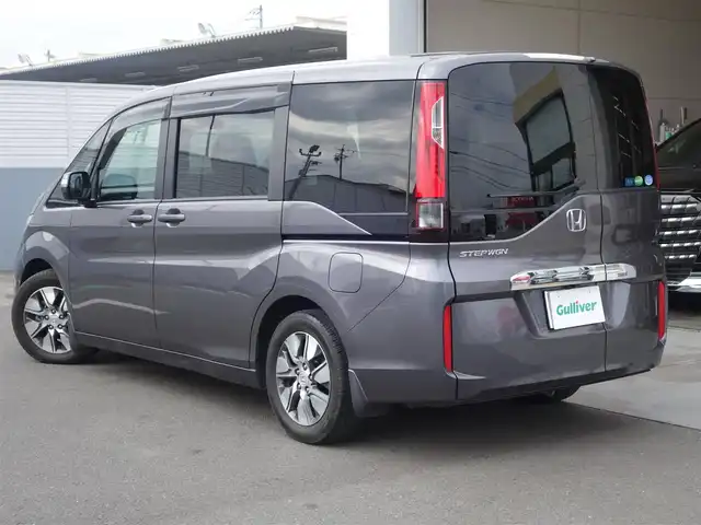 ホンダ ステップワゴン G EX 静岡県 2017(平29)年 2.5万km モダンスティールM ワンオーナー/両側パワースライドドア/ホンダセンシング/　衝突軽減ブレーキ/　アダプティブクルーズコントロール/　LKAS(車線維持支援システム）/　路外逸脱抑制システム/　誤発進抑制/　先行車発進お知らせ機能/　標識認識機能/純正Gathers９インチSDナビ/　DVD/CD/SD/BT/iPod/USB/フルセグTV/バックカメラ/ビルトインETC/社外前後ドライブレコーダー/前席シートヒーター/リアオートエアコン/わくわくテールゲート/2列目ロールサンシェード/シートバックテーブル/デジタルメーター/LEDヘッドライト/フォグライト/スマートキー2個/純正フロアマット/純正ドアバイザー/純正マッドガード/取扱説明書/保証書