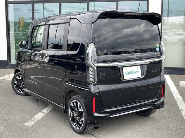 ホンダ Ｎ ＢＯＸ カスタム G EX ホンダセンシング 道東・釧路十勝 2017(平29)年 2.1万km クリスタルブラックパール ・４WD/・ホンダセンシング/・純正ギャザースナビ/　（AM FM CD DVD BT SD TV）/・両側パワースライドドア/・アダプティブクルーズコントロール/・スマートキー/・プッシュスタート/・衝突軽減ブレーキ/・誤発進抑制機能/・歩行者事故低減ステアリング/・路外逸脱抑制機能/・ビークル・スタビリティ・アシスト/・革巻きステアリング/・ステアリングスイッチ/・ビルトインETC/・パドルシフト/・ミラーヒーター/・ハーフレザーシート/・前席シートヒーター/・オートライト/・LEDライト/・フロントフォグランプ/・社外アルミホイール付き冬タイヤ積込/（165/55/15 2017年製造　5分山）