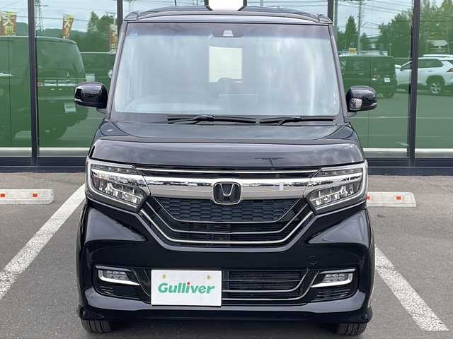 ホンダ Ｎ ＢＯＸ カスタム G EX ホンダセンシング 道東・釧路十勝 2017(平29)年 2.1万km クリスタルブラックパール ・４WD/・ホンダセンシング/・純正ギャザースナビ/　（AM FM CD DVD BT SD TV）/・両側パワースライドドア/・アダプティブクルーズコントロール/・スマートキー/・プッシュスタート/・衝突軽減ブレーキ/・誤発進抑制機能/・歩行者事故低減ステアリング/・路外逸脱抑制機能/・ビークル・スタビリティ・アシスト/・革巻きステアリング/・ステアリングスイッチ/・ビルトインETC/・パドルシフト/・ミラーヒーター/・ハーフレザーシート/・前席シートヒーター/・オートライト/・LEDライト/・フロントフォグランプ/・社外アルミホイール付き冬タイヤ積込/（165/55/15 2017年製造　5分山）
