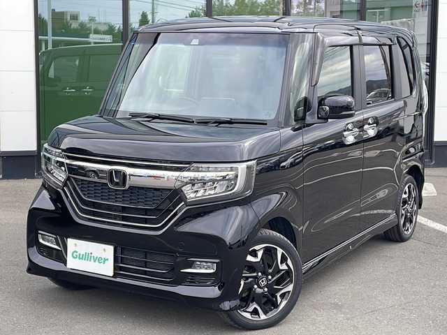 ホンダ Ｎ ＢＯＸ カスタム G EX ホンダセンシング 道東・釧路十勝 2017(平29)年 2.1万km クリスタルブラックパール ・４WD/・ホンダセンシング/・純正ギャザースナビ/　（AM FM CD DVD BT SD TV）/・両側パワースライドドア/・アダプティブクルーズコントロール/・スマートキー/・プッシュスタート/・衝突軽減ブレーキ/・誤発進抑制機能/・歩行者事故低減ステアリング/・路外逸脱抑制機能/・ビークル・スタビリティ・アシスト/・革巻きステアリング/・ステアリングスイッチ/・ビルトインETC/・パドルシフト/・ミラーヒーター/・ハーフレザーシート/・前席シートヒーター/・オートライト/・LEDライト/・フロントフォグランプ/・社外アルミホイール付き冬タイヤ積込/（165/55/15 2017年製造　5分山）