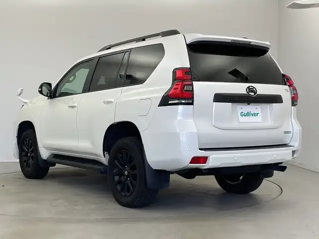 トヨタ ランドクルーザー プラド TX Lパッケージ マットブラED 新潟県 2023(令5)年 3.2万km ホワイトパールクリスタルシャイン サンルーフ/7人乗り/ベージュ革シート/プリクラッシュセーフティ/レーダークルーズコントロール/レーンキープアシスト/パーキングサポートブレーキ/ALPINEナビ/　・フルセグTV/　・CD/DVD/SD再生機能/　・Apple car play/　・HDMI/ALPINEフリップダウンモニター/ETC/パワーシート/電動格納サードシート/エアシート/シートヒーター/M’s SPEEDフロントハーフスポイラー/オートライト/オートハイビーム/LEDヘッドライト/プッシュスタート/社外ラバーマット/ステアリングスイッチ/オートドアミラー