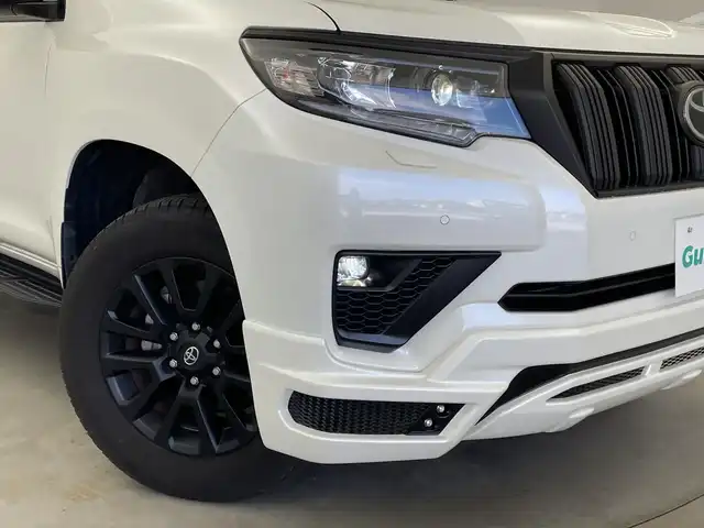 トヨタ ランドクルーザー プラド TX Lパッケージ マットブラED 新潟県 2023(令5)年 3.2万km ホワイトパールクリスタルシャイン サンルーフ/7人乗り/ベージュ革シート/プリクラッシュセーフティ/レーダークルーズコントロール/レーンキープアシスト/パーキングサポートブレーキ/ALPINEナビ/　・フルセグTV/　・CD/DVD/SD再生機能/　・Apple car play/　・HDMI/ALPINEフリップダウンモニター/ETC/パワーシート/電動格納サードシート/エアシート/シートヒーター/M’s SPEEDフロントハーフスポイラー/オートライト/オートハイビーム/LEDヘッドライト/プッシュスタート/社外ラバーマット/ステアリングスイッチ/オートドアミラー