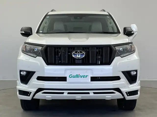 トヨタ ランドクルーザー プラド TX Lパッケージ マットブラED 新潟県 2023(令5)年 3.2万km ホワイトパールクリスタルシャイン サンルーフ/7人乗り/ベージュ革シート/プリクラッシュセーフティ/レーダークルーズコントロール/レーンキープアシスト/パーキングサポートブレーキ/ALPINEナビ/　・フルセグTV/　・CD/DVD/SD再生機能/　・Apple car play/　・HDMI/ALPINEフリップダウンモニター/ETC/パワーシート/電動格納サードシート/エアシート/シートヒーター/M’s SPEEDフロントハーフスポイラー/オートライト/オートハイビーム/LEDヘッドライト/プッシュスタート/社外ラバーマット/ステアリングスイッチ/オートドアミラー