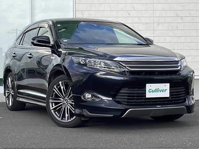 トヨタ ハリアー ハイブリッド プレミアム 岩手県 2015(平27)年 6.4万km スパークリングブラックパールクリスタルシャイン 4WD/純正9インチナビ(CD/DVD/SD/ラジオ/BT)/モデリスタエアロ(F/S/R)/フルセグテレビ/バックカメラ/パワーバックドア/レーンディパーチャーアラート/オートハイビーム/クルーズコントロール/前席パワーシート/ハーフレザーシート/ビルトインETC/LEDヘッドライト/フォグランプ/社外20inアルミホイール/純正フロアマット/スマートキー/プッシュスタート/電動格納ミラー/ウィンカーミラー/ドアバイザー