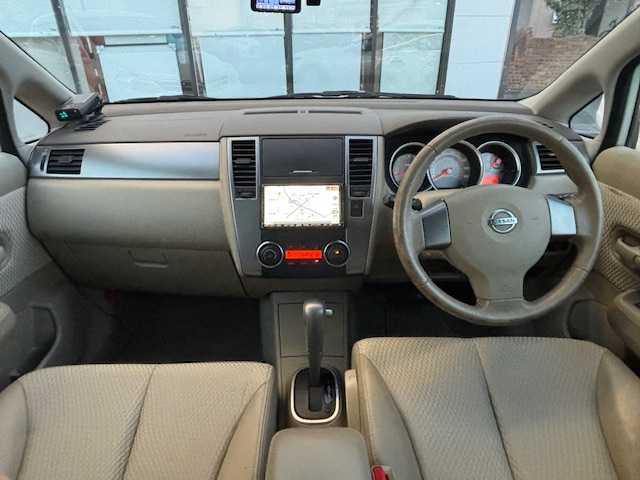 日産 ティーダ 15M 宮城県 2011(平23)年 6.1万km ホワイトパール 登録時走行距離60593km/純正ＳＤナビ/フルセグ／ＣＤ／ＤＶＤ／Ｂｌｕｅｔｏｏｔｈ/ドアバイザー/AAC/電動格納ミラー/純正フロアマット/純正ドアバイザー/純正ホイールキャップ/ヘッドライトレベライザー/エコモードスイッチ/オートライト