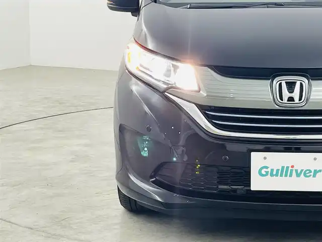 ホンダ フリード ハイブリット G ホンダセンシング 福島県 2017(平29)年 2.9万km クリスタルブラックパール ホンダセンシング/・衝突軽減ブレーキ〈CMBS〉/・誤発進抑制機能/・ACC〈アダプティブ・クルーズ・コントロール〉/・LKAS〈車線維持支援システム〉/・歩行者事故低減ステアリング/・路外逸脱抑制機能/・先行車発進お知らせ機能/・標識認識機能/純正ナビ/・型番：VXM-174VPi/・フルセグTV/Bluetooth/CD/DVD/・バックカメラ/・ETC/・ドライブレコーダー/両側パワースライドドア/アイドリングストップ/ステアリングスイッチ/ハーフレザーシート/プッシュスタート/・スマートキー/LEDヘッドライト/・オートライト/純正フロアマット