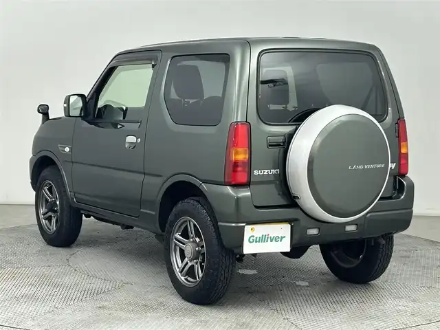 スズキ ジムニー ランドベンチャー 道央・札幌 2015(平27)年 8.7万km クールカーキPM ・４WD/・Panasonicメモリーナビ(CN-R301Z)/　CD/DVD/SD/BT/フルセグTV/・バックカメラ/・ステアリングスイッチ/・ドライブレコーダー/・ETC/・ハロゲンヘッドライト/・フロントフォグランプ/・ヘッドランプレベライザー/・ドアミラーウィンカー/・ミラーヒーター/・ドアバイザー/・専用シート表皮/・D席シートヒーター/・本革巻きステアリング/・純正16インチAW/・純正フロアマット/・キーレス/・スペアキー/・取扱説明書/・保証書