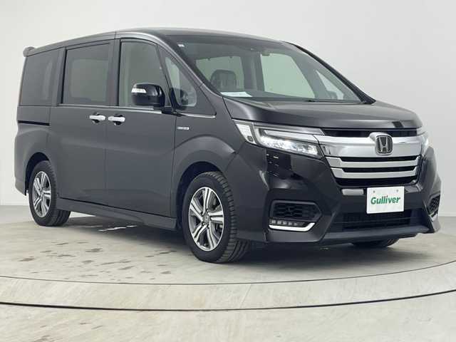 ホンダ ステップワゴン スパーダ ハイブリッド G ホンダセンシング 熊本県 2019(平31)年 4.6万km プレミアムスパークルブラックパール 純正ナビ（ＣＤ・ＤＶＤ・フルセグ・ＢＴ・ＳＤ・ＵＳＢ）/バックカメラ　/純正フリップダウンモニター　/社外前後ドライブレコーダー　/ビルトインＥＴＣ　/両側パワースライドドア　/クルーズコントロール/衝突軽減ブレーキ/レーンキープアシスト/横滑り防止/アイドリングストップ/純正フロアマット/純正16インチAW/オートライト/LEDヘッドライト/フォグランプ/スマートキー/プッシュスタート