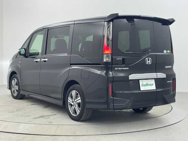 ホンダ ステップワゴン スパーダ ハイブリッド G ホンダセンシング 熊本県 2019(平31)年 4.6万km プレミアムスパークルブラックパール 純正ナビ（ＣＤ・ＤＶＤ・フルセグ・ＢＴ・ＳＤ・ＵＳＢ）/バックカメラ　/純正フリップダウンモニター　/社外前後ドライブレコーダー　/ビルトインＥＴＣ　/両側パワースライドドア　/クルーズコントロール/衝突軽減ブレーキ/レーンキープアシスト/横滑り防止/アイドリングストップ/純正フロアマット/純正16インチAW/オートライト/LEDヘッドライト/フォグランプ/スマートキー/プッシュスタート