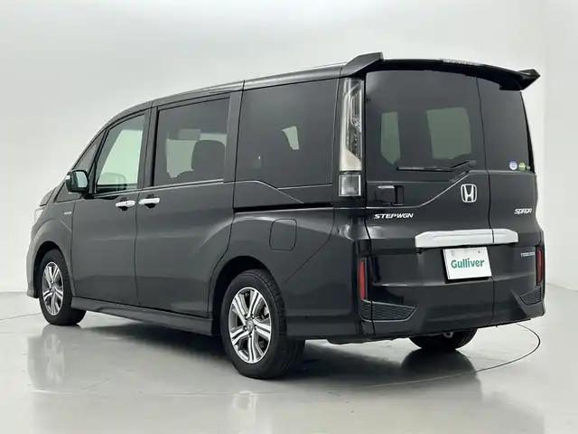 ホンダ ステップワゴン スパーダ ハイブリッド G ホンダセンシング 熊本県 2019(平31)年 4.6万km プレミアムスパークルブラックパール 純正ナビ（ＣＤ・ＤＶＤ・フルセグ・ＢＴ・ＳＤ・ＵＳＢ）/バックカメラ　/純正フリップダウンモニター　/社外前後ドライブレコーダー　/ビルトインＥＴＣ　/両側パワースライドドア　/クルーズコントロール/衝突軽減ブレーキ/レーンキープアシスト/横滑り防止/アイドリングストップ/純正フロアマット/純正16インチAW/オートライト/LEDヘッドライト/フォグランプ/スマートキー/プッシュスタート