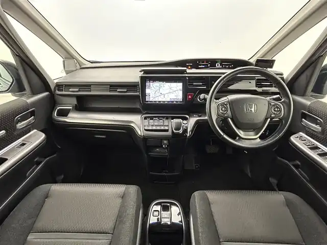 ホンダ ステップワゴン スパーダ ハイブリッド G ホンダセンシング 熊本県 2019(平31)年 4.6万km プレミアムスパークルブラックパール 純正ナビ（ＣＤ・ＤＶＤ・フルセグ・ＢＴ・ＳＤ・ＵＳＢ）/バックカメラ　/純正フリップダウンモニター　/社外前後ドライブレコーダー　/ビルトインＥＴＣ　/両側パワースライドドア　/クルーズコントロール/衝突軽減ブレーキ/レーンキープアシスト/横滑り防止/アイドリングストップ/純正フロアマット/純正16インチAW/オートライト/LEDヘッドライト/フォグランプ/スマートキー/プッシュスタート
