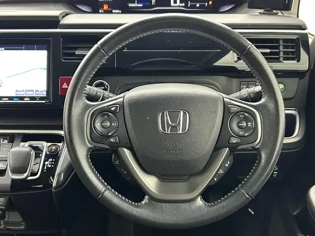 ホンダ ステップワゴン スパーダ ハイブリッド G ホンダセンシング 熊本県 2019(平31)年 4.6万km プレミアムスパークルブラックパール 純正ナビ（ＣＤ・ＤＶＤ・フルセグ・ＢＴ・ＳＤ・ＵＳＢ）/バックカメラ　/純正フリップダウンモニター　/社外前後ドライブレコーダー　/ビルトインＥＴＣ　/両側パワースライドドア　/クルーズコントロール/衝突軽減ブレーキ/レーンキープアシスト/横滑り防止/アイドリングストップ/純正フロアマット/純正16インチAW/オートライト/LEDヘッドライト/フォグランプ/スマートキー/プッシュスタート