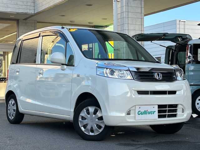 ホンダ ライフ G スマートプラス 東京都 2011(平23)年 1.4万km プレミアムホワイトパール ワンオーナー/社外SDナビ/Bluetooth/フルセグTV/バックカメラ/AM・FM/CD・DVD/オートエアコン(AAC)/スマートキー/ETC/ABS/盗難防止装置/ハロゲンヘッドライト/エアバッグ(ダブル)/保証書＆取扱説明書