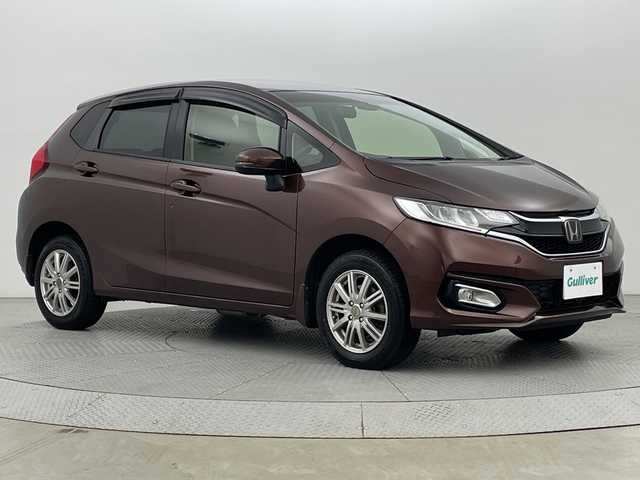 ホンダ フィット 13G L ホンダセンシング 新潟県 2017(平29)年 10万km プレミアムアガットブラウンP 4WD/メモリナビ　型式VXM-184VFi/CD/BT/DVD/バックカメラ/フルセグ/クルコン/ホンダセンシング/フォグ/夏タイヤAWセット