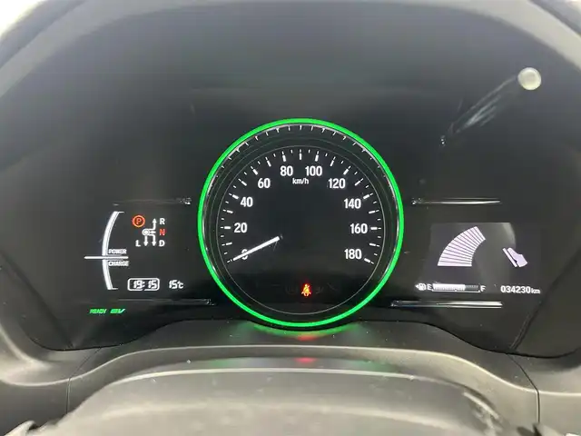 ホンダ ヴェゼル ハイブリッド Z ホンダセンシング 千葉県 2017(平29)年 3.5万km ホワイトオーキッドパール 禁煙/純正ナビ VXM-174CSi/Bluetooth/TV/CD/SD/USB/バックモニター/本革シート/パワーシート/D席シートメモリ/D/N席シートヒーター/チップアップシート/フルフラットシート/ルーフレール/純正スポーツタイプアルミホイール/LEDプロジェクターヘッドライト/LEDフォグランプ/ETC/スペアキー1本/ホンダセンシング/衝突軽減ブレーキ/歩行者事故低減ステアリング/アダプティブクルーズコントロール/車線維持支援システム/路外逸脱抑制機能/誤発進抑制機能/先行車発進お知らせ機能/標識認識機能