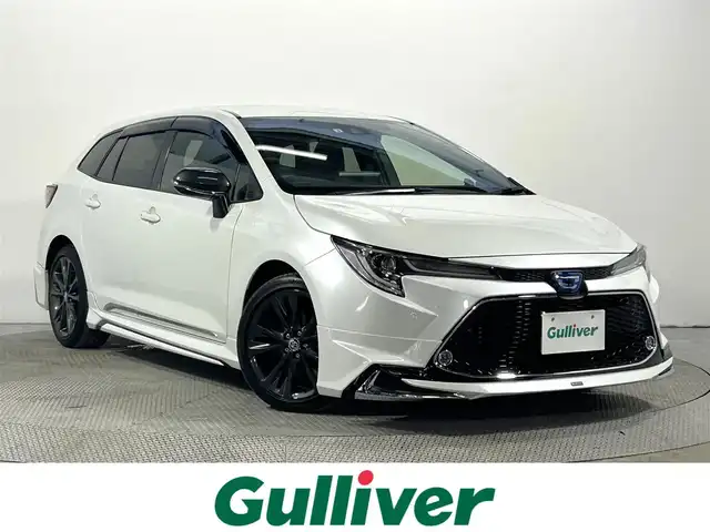 トヨタ カローラツーリング ハイブリッド ダブルバイビー 大阪府 2022(令4)年 2.4万km プラチナホワイトパールマイカ モデリスタエアロ 純正ナビ(フルセグ/DVD再生/Bluetooth) バックカメラ ETC 衝突軽減 レーダークルコン クリアランスソナー レーンアシスト ハーフレザー ワンオーナー