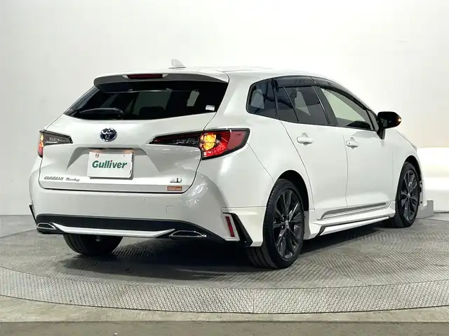 トヨタ カローラツーリング ハイブリッド ダブルバイビー 大阪府 2022(令4)年 2.4万km プラチナホワイトパールマイカ モデリスタエアロ 純正ナビ(フルセグ/DVD再生/Bluetooth) バックカメラ ETC 衝突軽減 レーダークルコン クリアランスソナー レーンアシスト ハーフレザー ワンオーナー