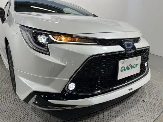 トヨタ カローラツーリング ハイブリッド ダブルバイビー 大阪府 2022(令4)年 2.4万km プラチナホワイトパールマイカ モデリスタエアロ 純正ナビ(フルセグ/DVD再生/Bluetooth) バックカメラ ETC 衝突軽減 レーダークルコン クリアランスソナー レーンアシスト ハーフレザー ワンオーナー