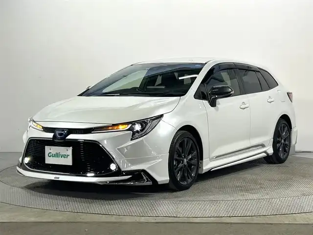 トヨタ カローラツーリング ハイブリッド ダブルバイビー 大阪府 2022(令4)年 2.4万km プラチナホワイトパールマイカ モデリスタエアロ 純正ナビ(フルセグ/DVD再生/Bluetooth) バックカメラ ETC 衝突軽減 レーダークルコン クリアランスソナー レーンアシスト ハーフレザー ワンオーナー