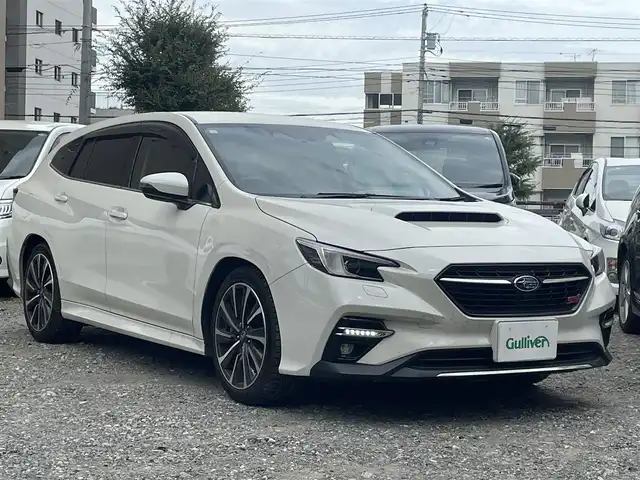 スバル レヴォーグ 1．8STIスポーツ EX 青森県 2020(令2)年 7万km クリスタルホワイトP ワンオーナー/4WD/ターボ/Apple Car Play/Android Auto/純正メモリナビ/ (フルセグTV/Bluetooth/DVD/USB)/バックカメラ/サイドカメラ/ETC/レザーシート/前席パワーシート【D席メモリ機能】/全席シートヒーター/パワーバックドア/アイサイトX/・全車速追従機能付クルーズコントロール/・プリクラッシュブレーキ/・アイサイトツーリングアシスト/・アクティブレーンキープ/・AT誤発進抑制制御/・AT誤後進抑制制御/・後退時ブレーキアシスト/・車線逸脱警報/・ふらつき警報/・先行車発進お知らせ/・スバルリヤビークルディテクション/・エマージェンシーレーンキープアシスト/・ドライバーモニタリングシステム/・アレイ式アダプティブドライビングビーム/横滑り防止装置/スマートキー/純正18インチアルミホイール/純正LEDヘッドライト/パドルシフト/スペアキー1本/保証書/取扱説明書